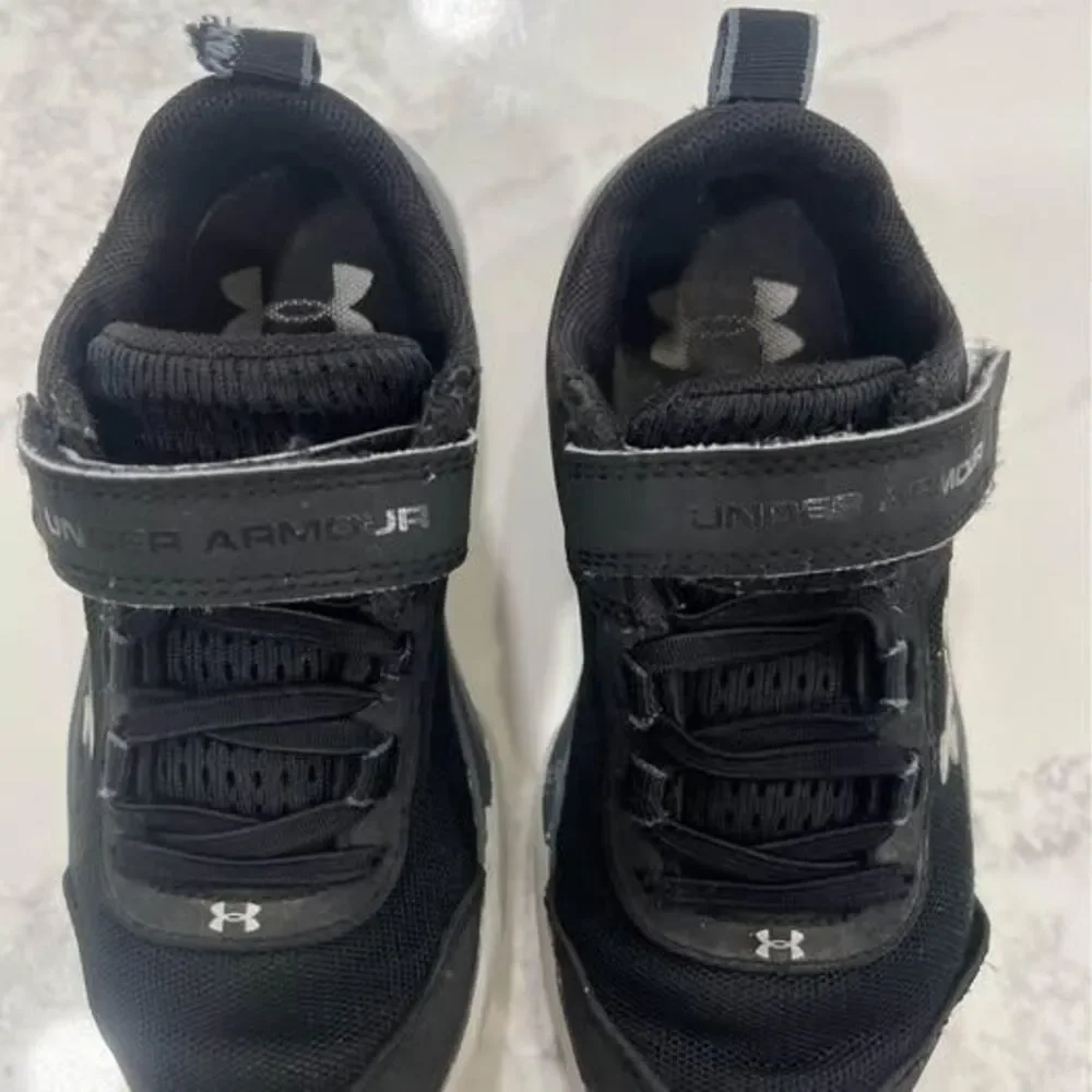 12K Shoes Sneakers black silver some wear toddler Under Armour tennis shoes